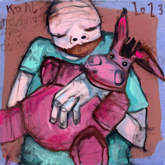 Holding the donkey
